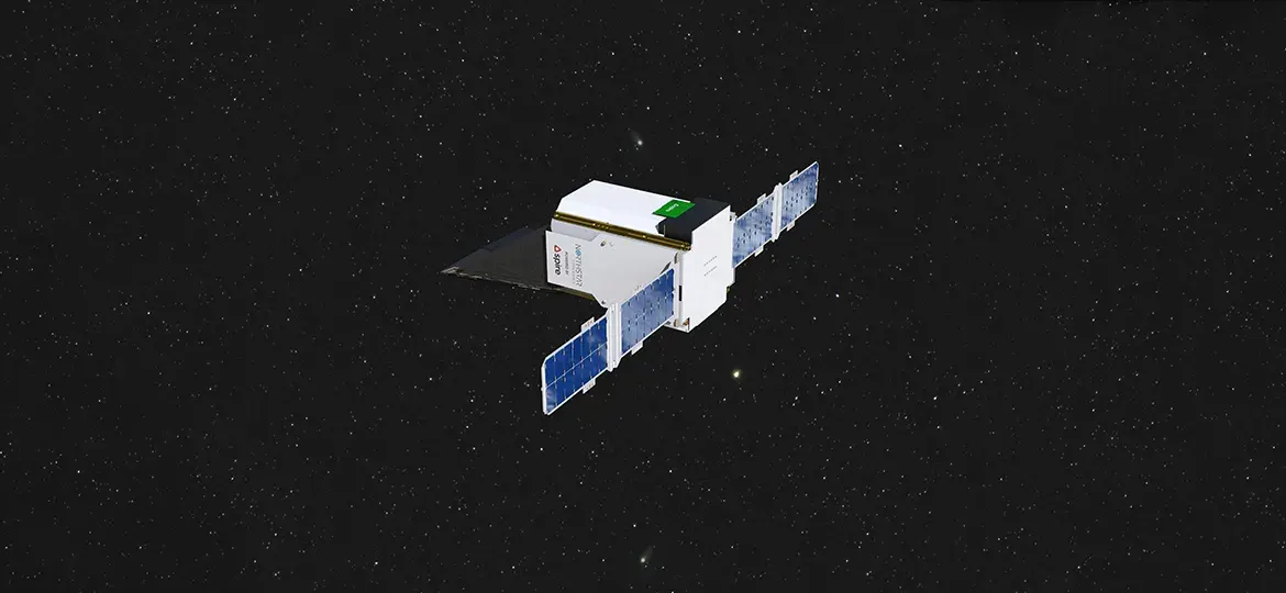 Satellite with extended solar panels flying in deep space against a star filled background