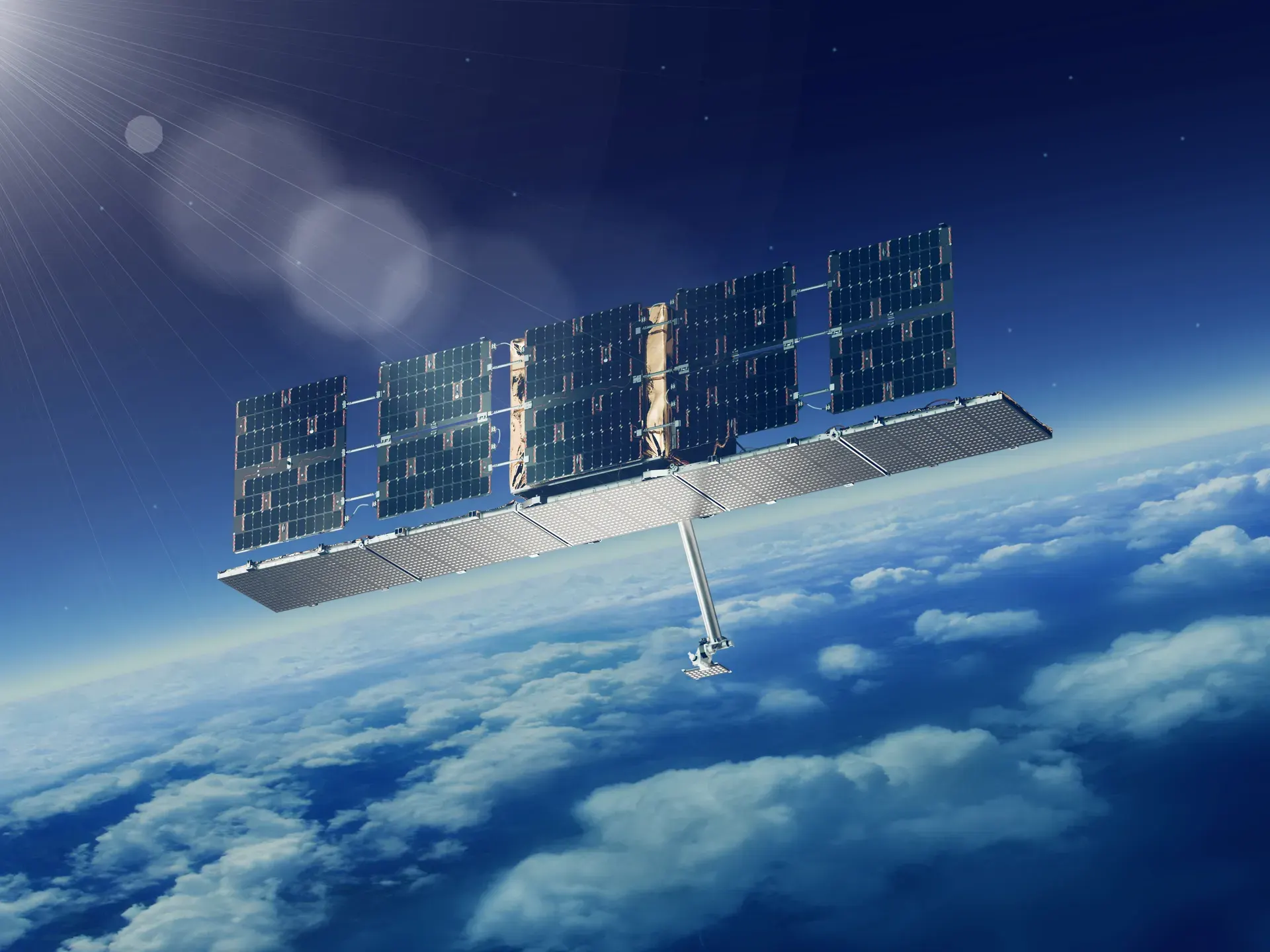 Satellite with solar panels orbiting above Earth with clouds below