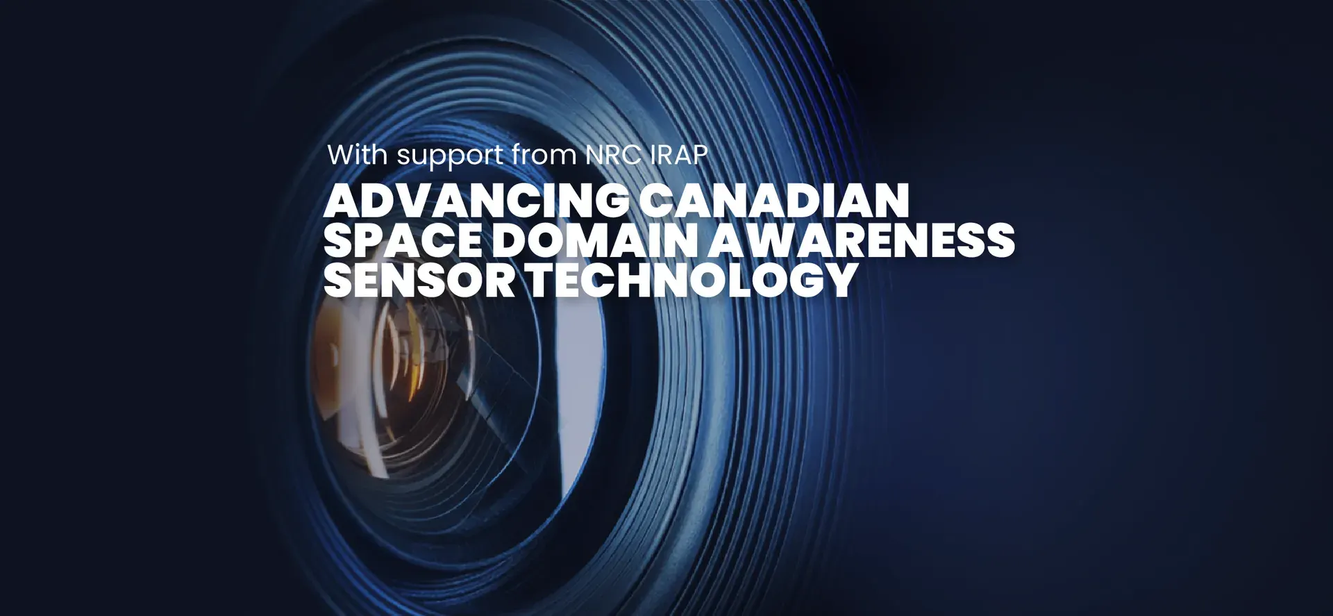 Close-up view of a camera-style sensor lens displaying text about advancing Canadian SDA technology.