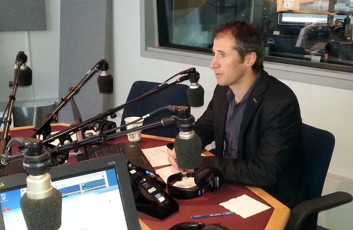 Portrait of Frederic Pelletier speaking during a radio interview for a CBC segment.